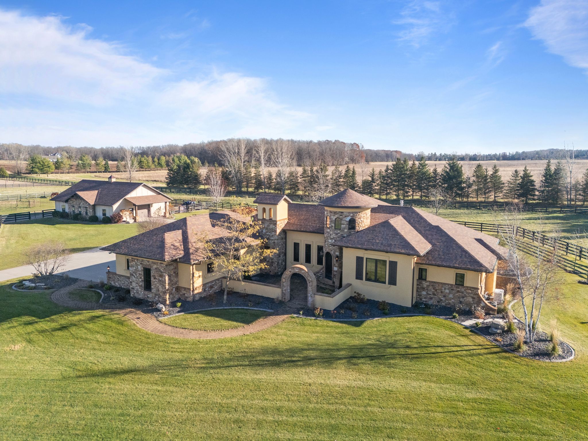 Mediterranean Revival home with barn Appleton