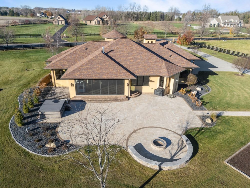 Expanded patio and fire pit in luxury equestrian estate, Appleton WI