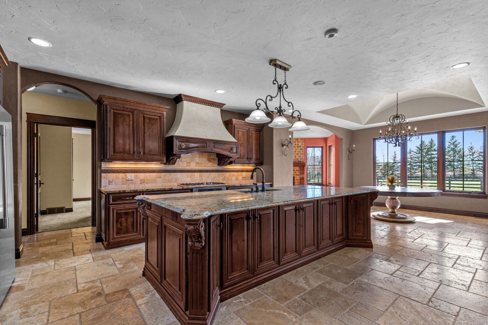 Gourmet kitchen with granite countertops, luxury Appleton WI home