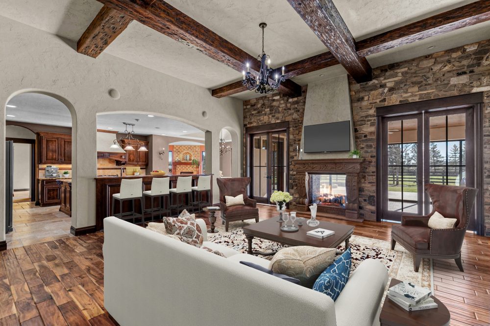 Elegant living room with Cantera stone fireplace, Appleton WI luxury home