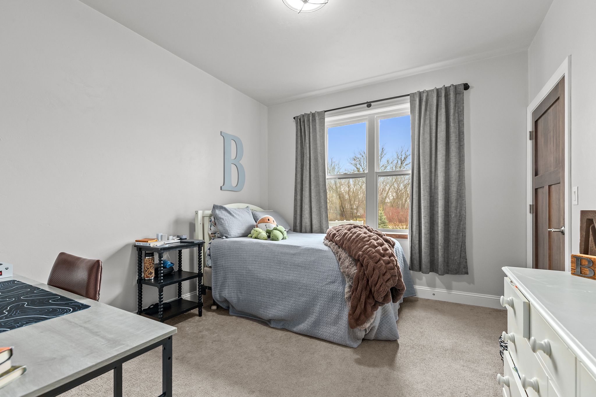 Bedroom with backyard view at W6681 Charleen Ln in Greenville, WI