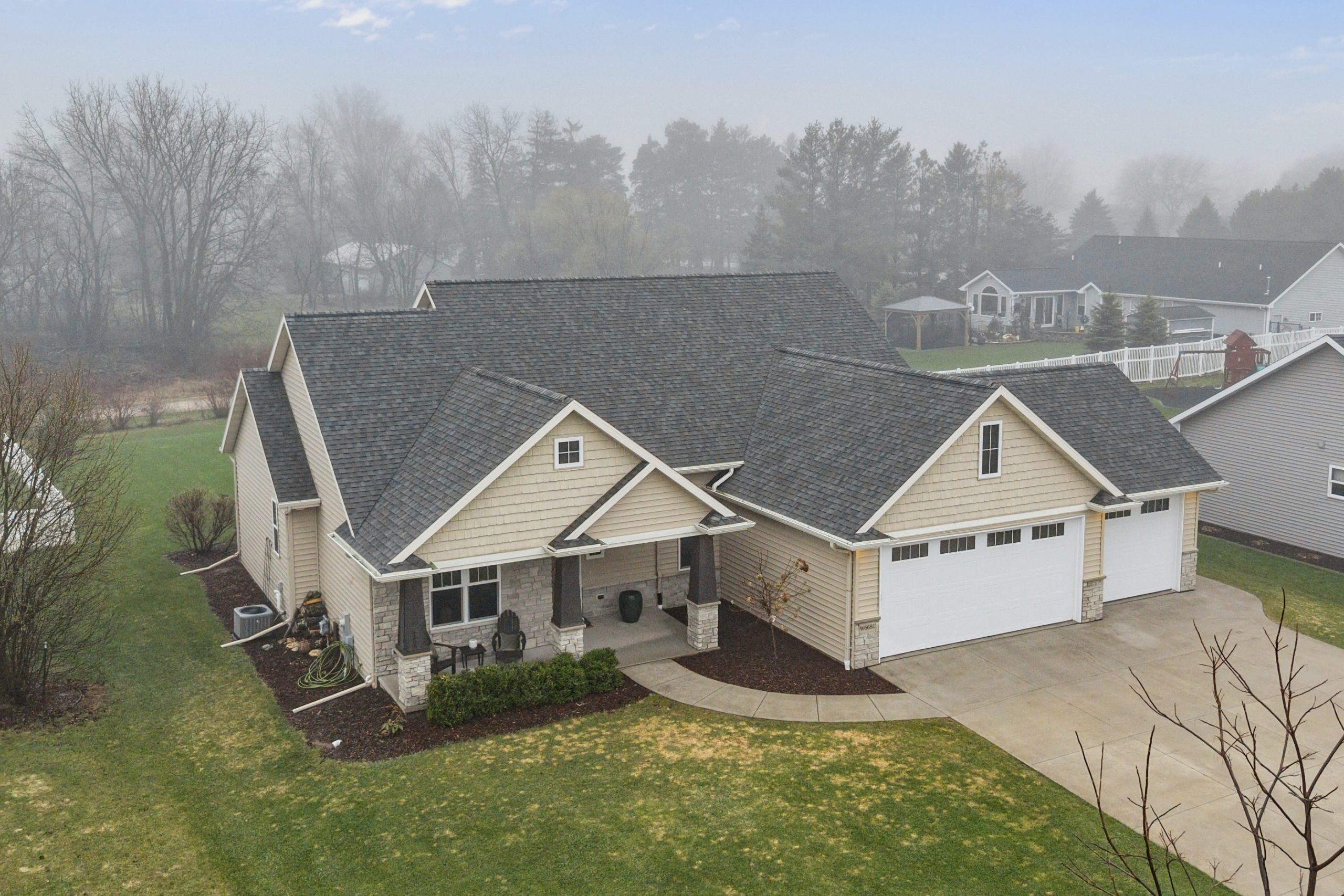Wide front exterior view of W6681 Charleen Ln in Greenville, WI
