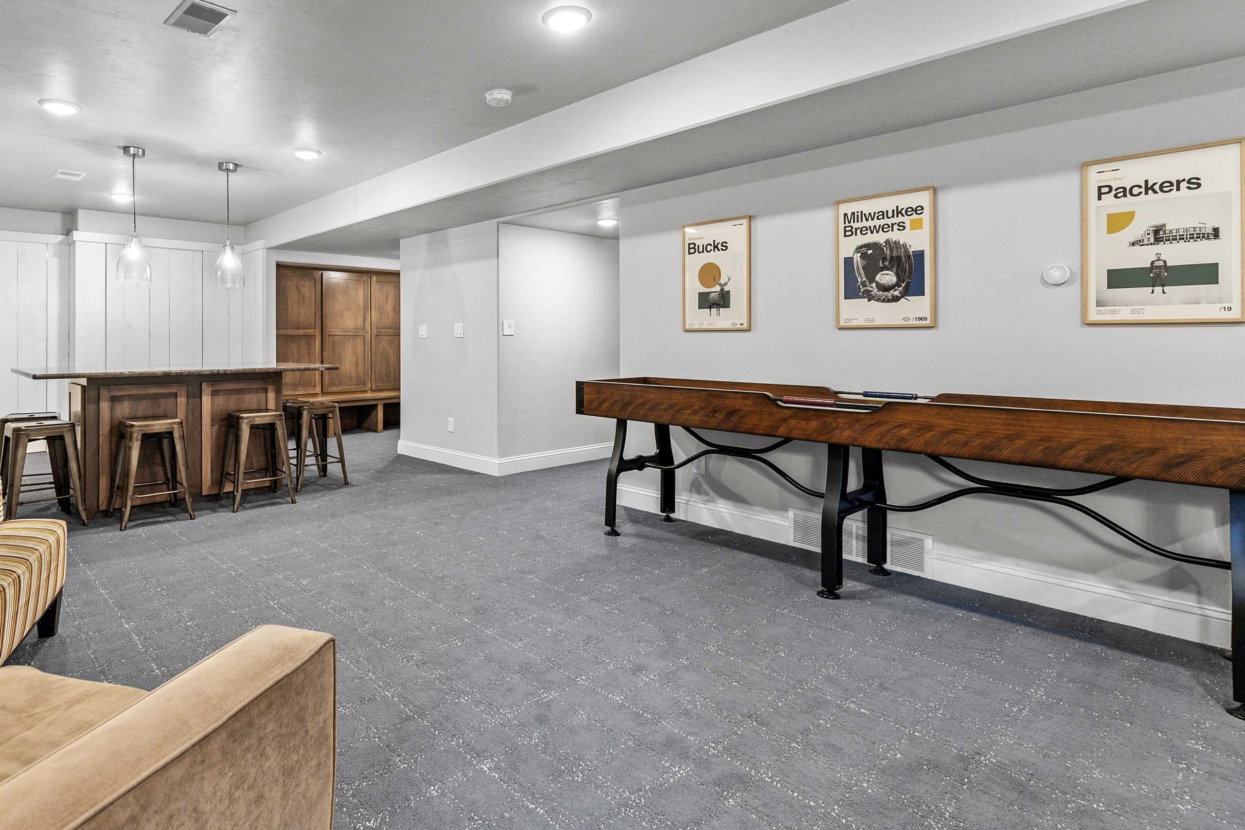 Lower-level rec room island and seating area at W6681 Charleen Ln in Greenville, WI