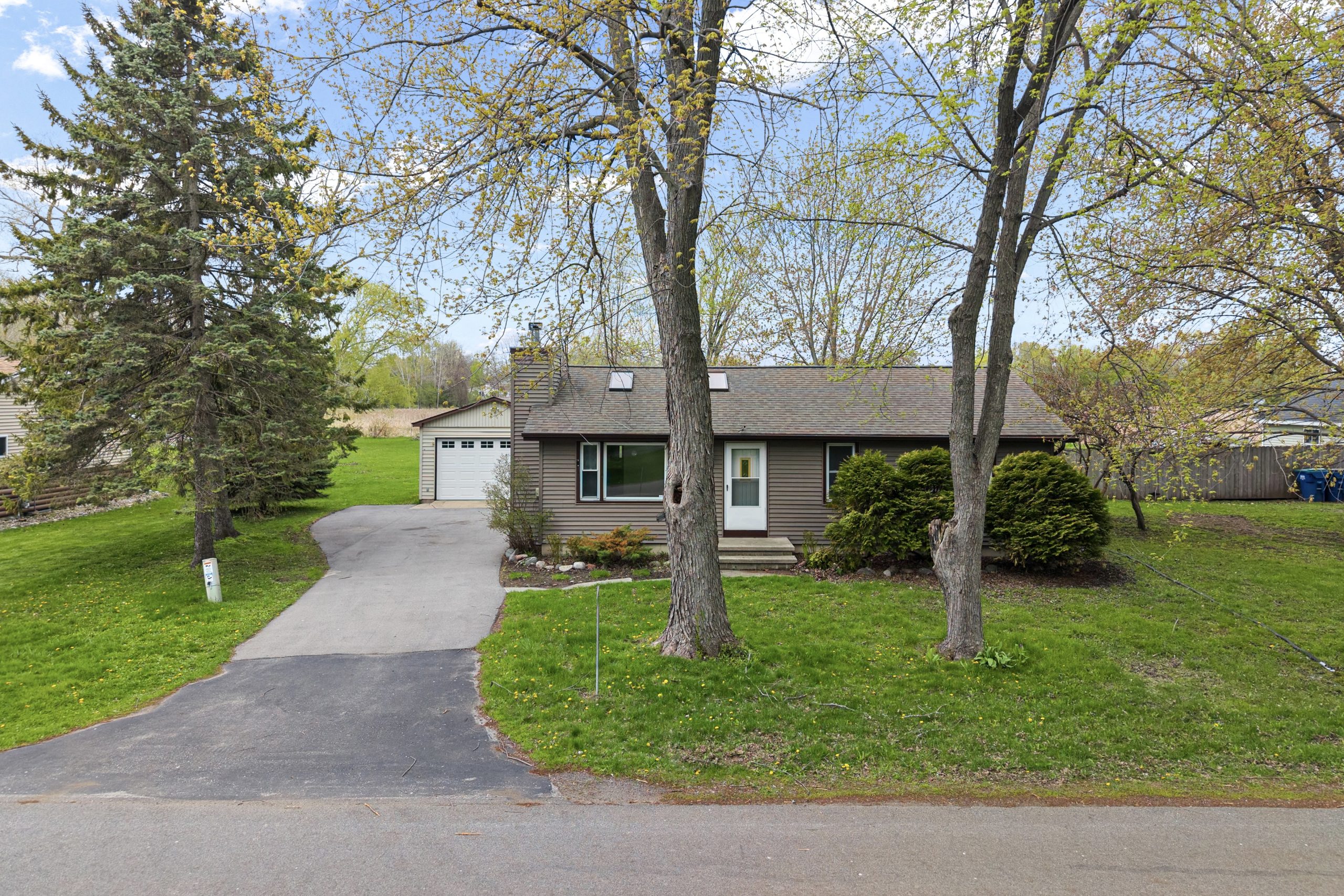 Front exterior aerial view of 607 Hunters Point Rd in Neenah Wisconsin