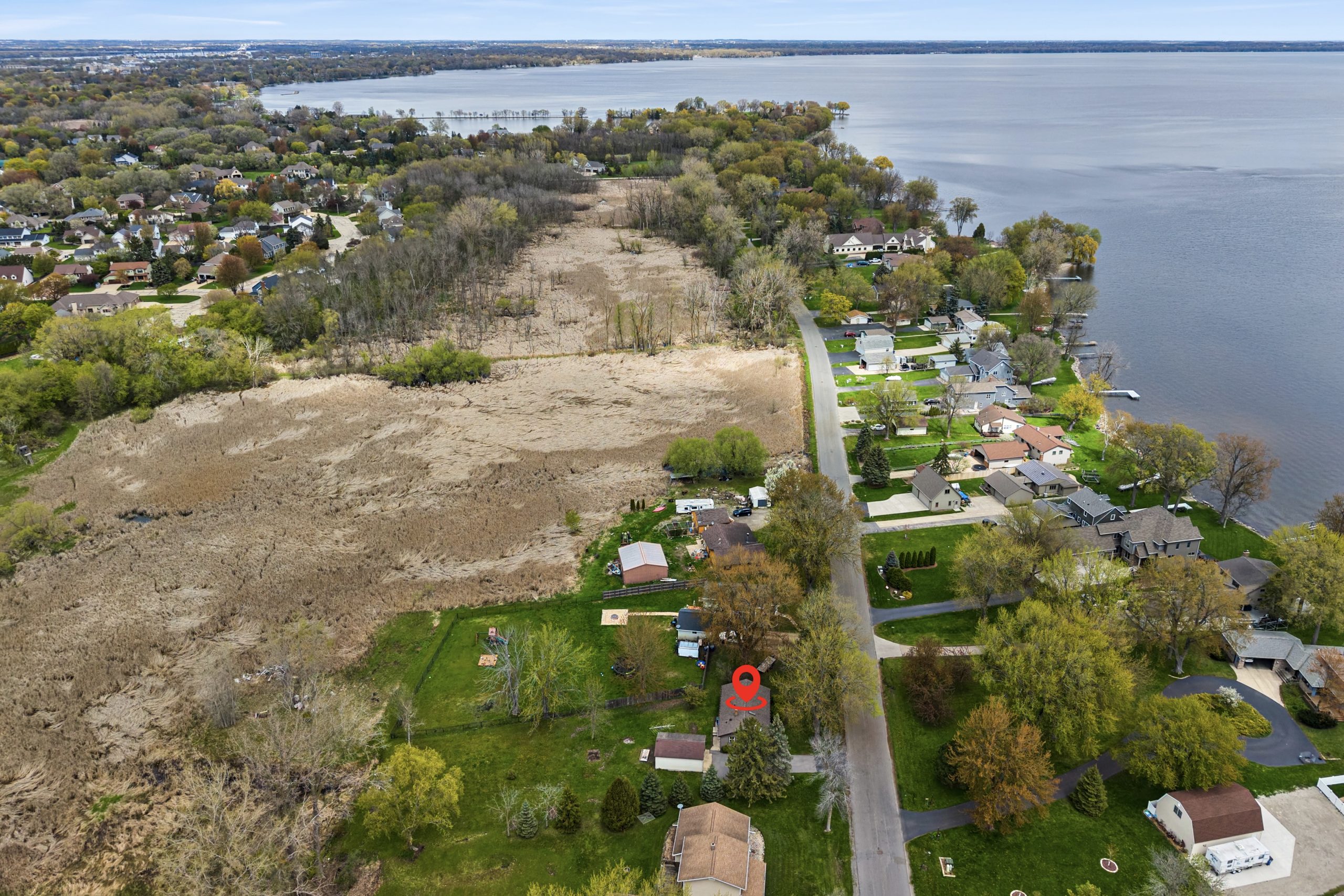 Shoreline aerial near Lake Winnebago by 607 Hunters Point Rd in Neenah Wisconsin