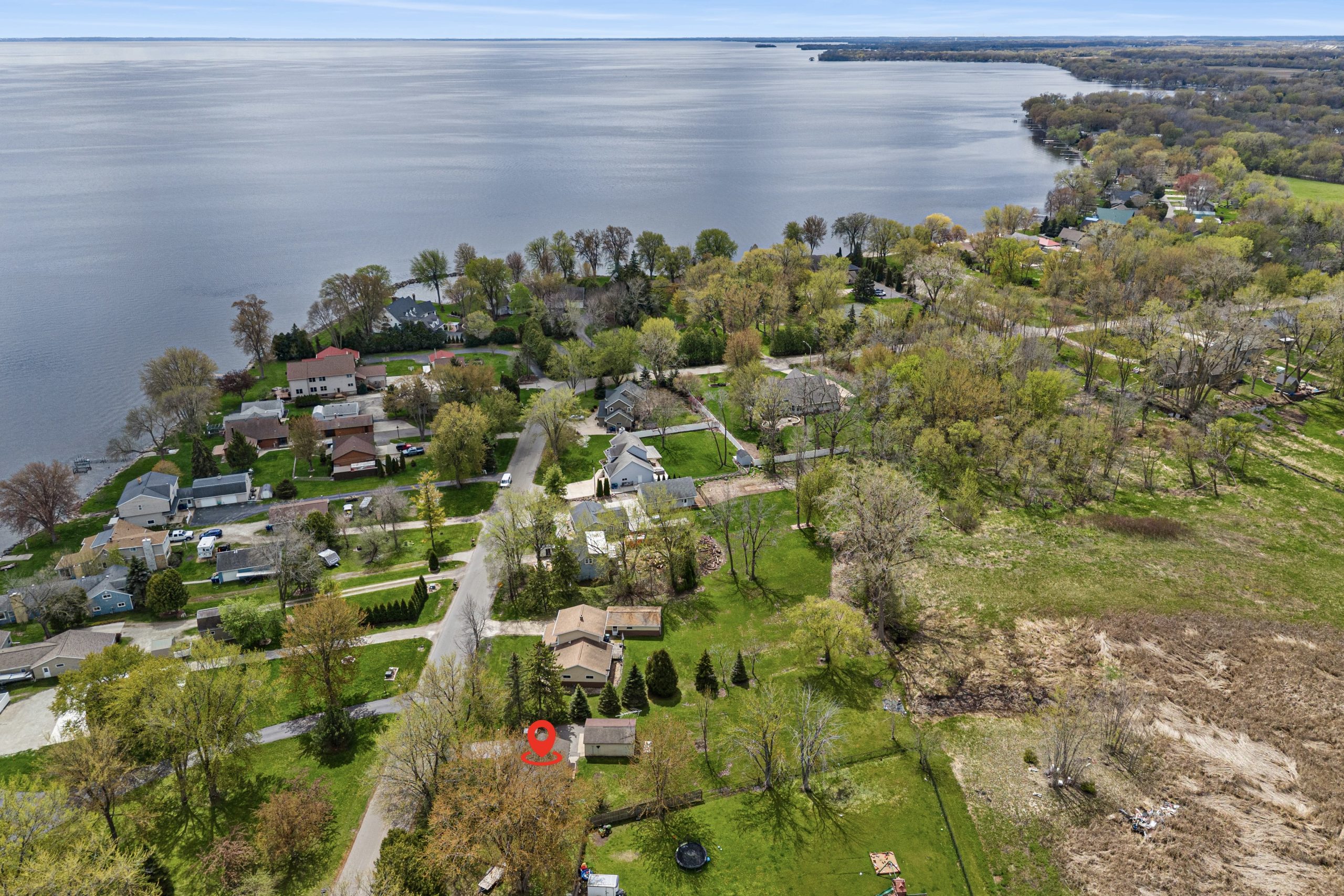 Aerial view of the waterfront neighborhood near 607 Hunters Point Rd in Neenah Wisconsin