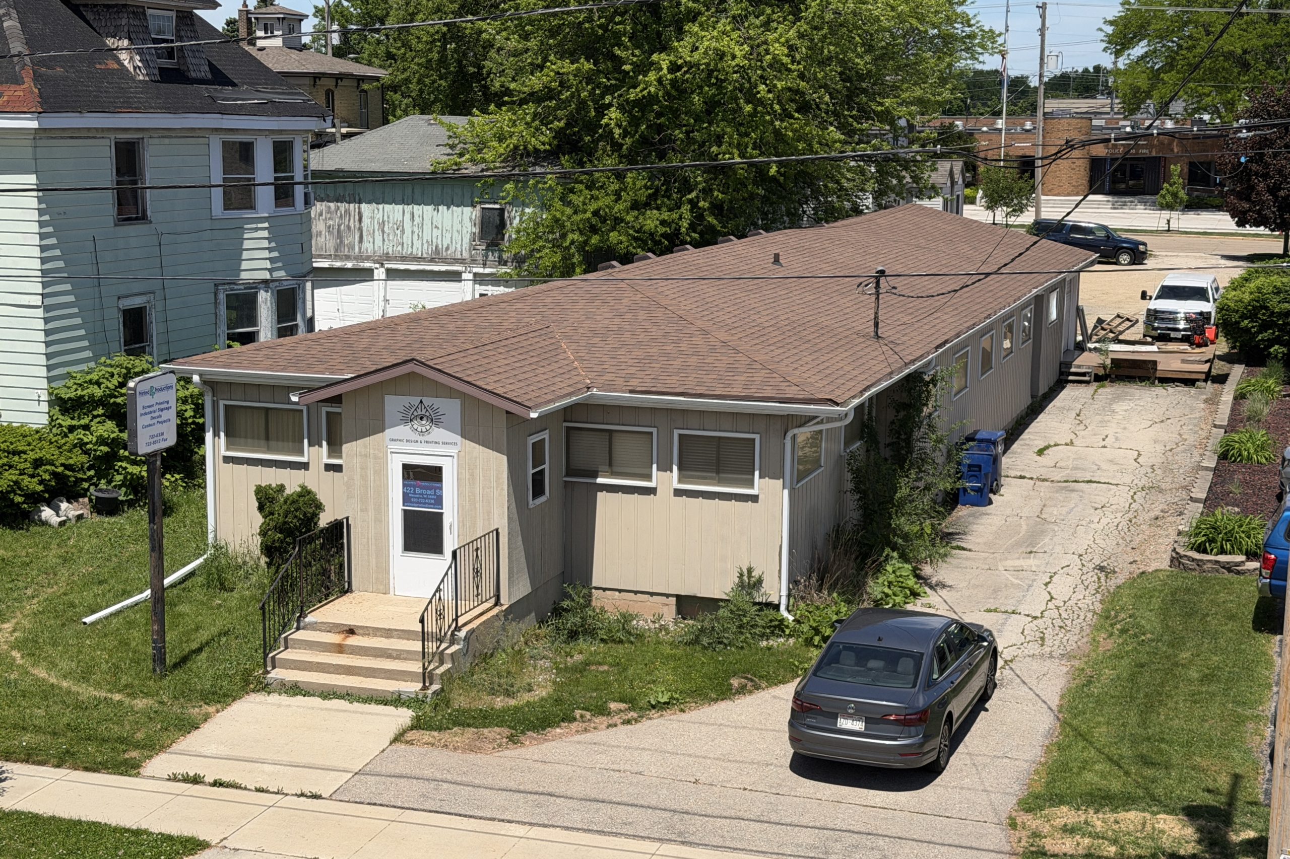 Aerial front view of commercial property at 422 Broad St Menasha WI