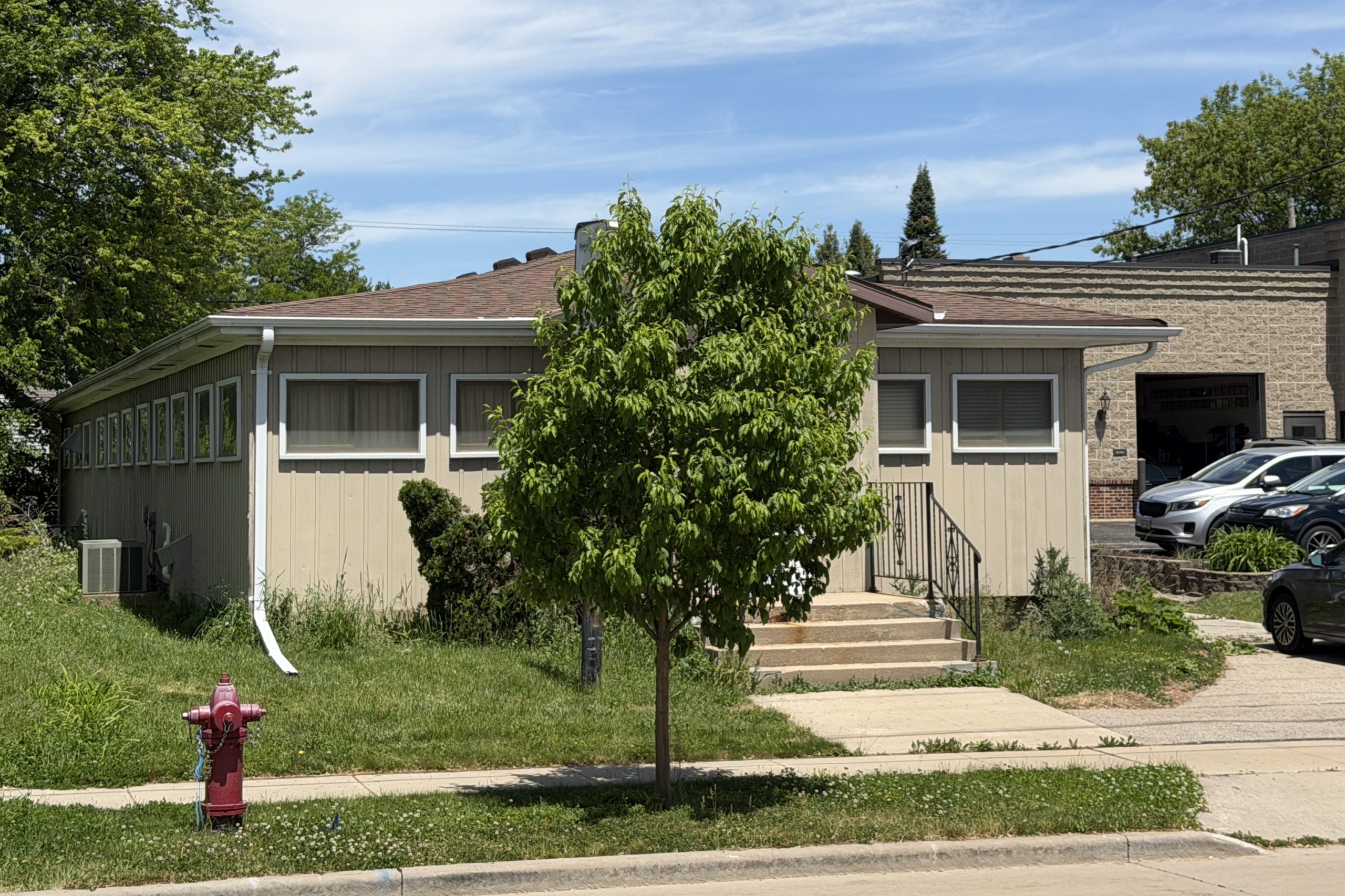 Commercial property exterior with street frontage at 422 Broad St Menasha WI